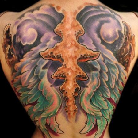 Женское татуировки в стиле органика на спине